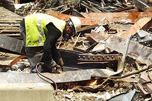 Image of a worker in a demolition site